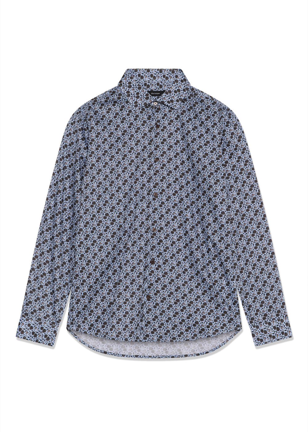A long-sleeve button-up shirt with a dense, small-scale floral or geometric print in navy blue and white, laid flat against a solid white background.