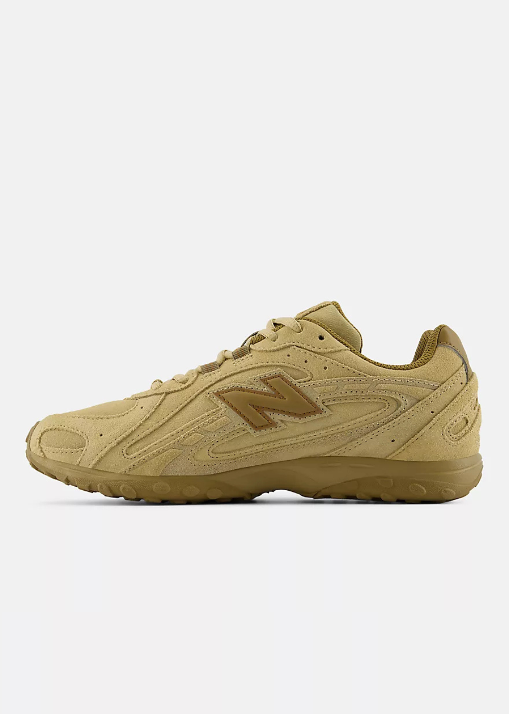 A single New Balance sneaker in a monochromatic tan and brown colorway, shown from the side profile against a light gray background.
