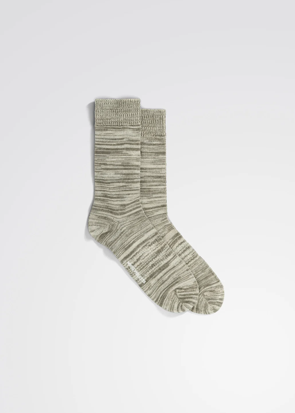 Zoomed out view of the Bjarki Cotton Twist Sock in Sediment Green by Norse Projects.