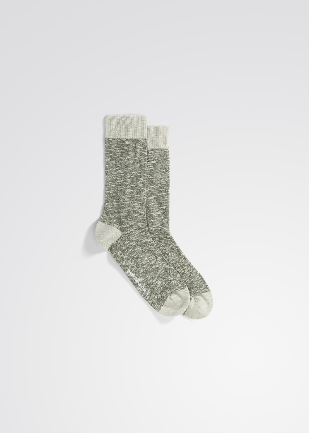 Norse Project Sock with contrasting heel, toe, and cuff in sediment green.
