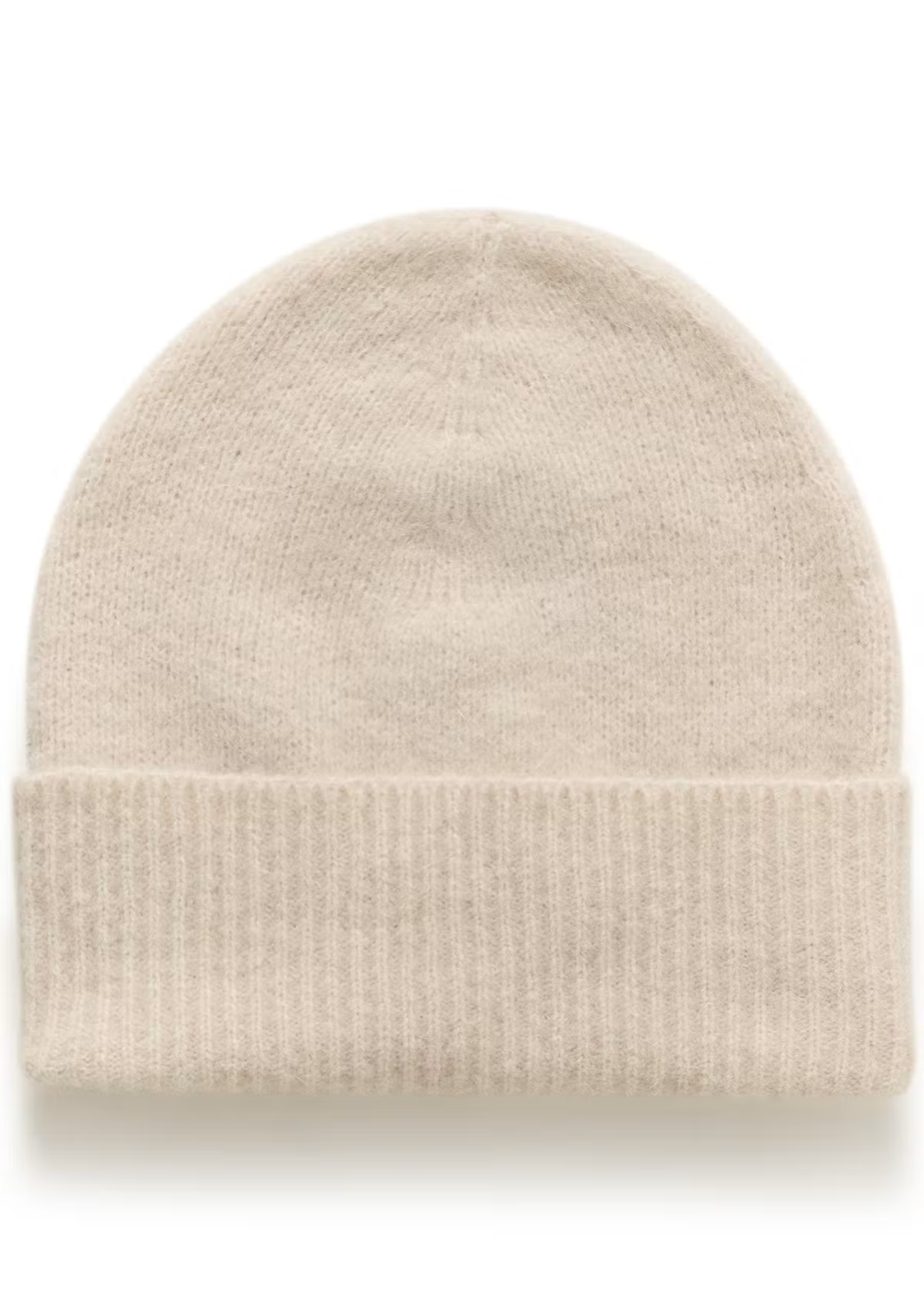 A light beige knit beanie hat with a folded ribbed cuff, shown against a plain white background.