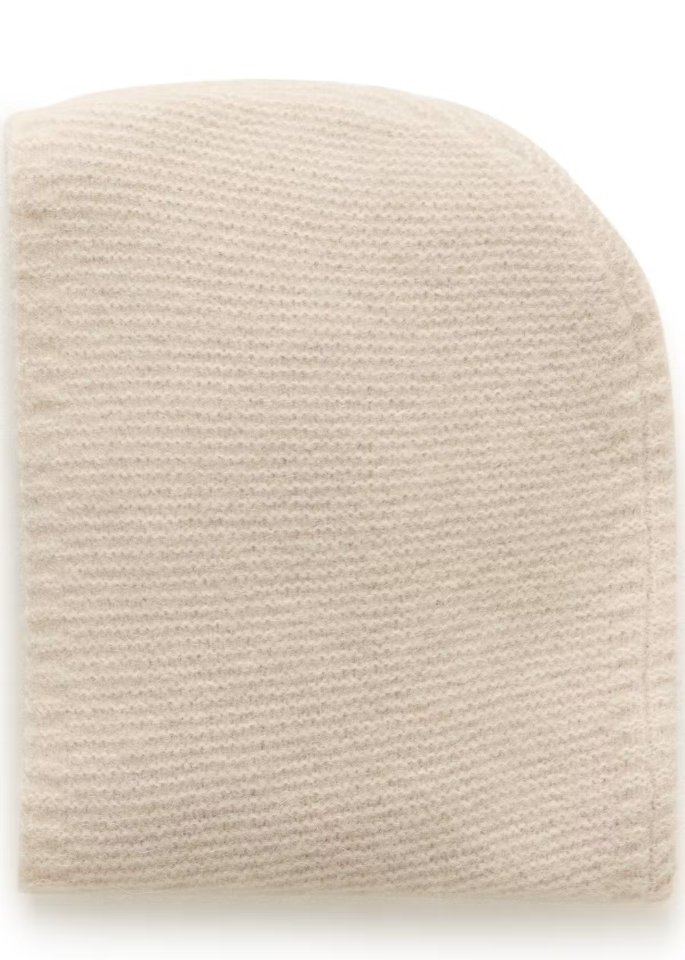 A folded cream-colored knit fabric accessory, likely a pocket square or scarf, showing a fine ribbed texture against a plain white background.