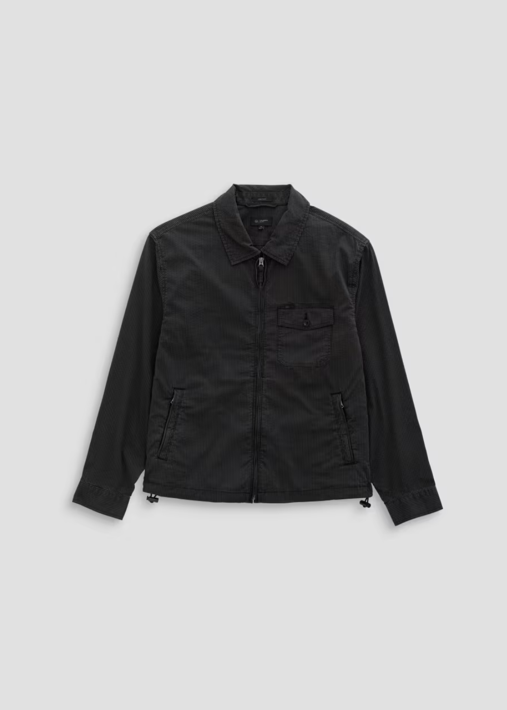 A black utility jacket with a zippered front, pointed collar, and chest pocket, displayed flat against a light gray background.