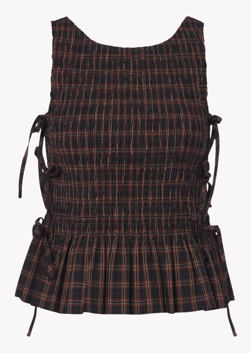 A sleeveless smocked top with a dark brown and black plaid pattern, featuring side tie details and a ruffled peplum hem, shown against a plain white background.