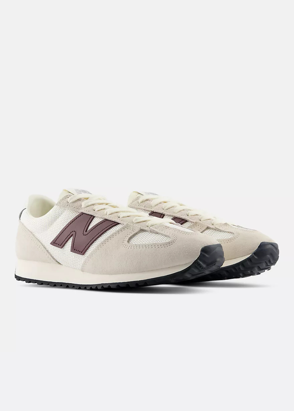 New Balance 471 sneakers in beige suede and mesh with a burgundy 'N' logo and black outsole, shown on a light gray background.