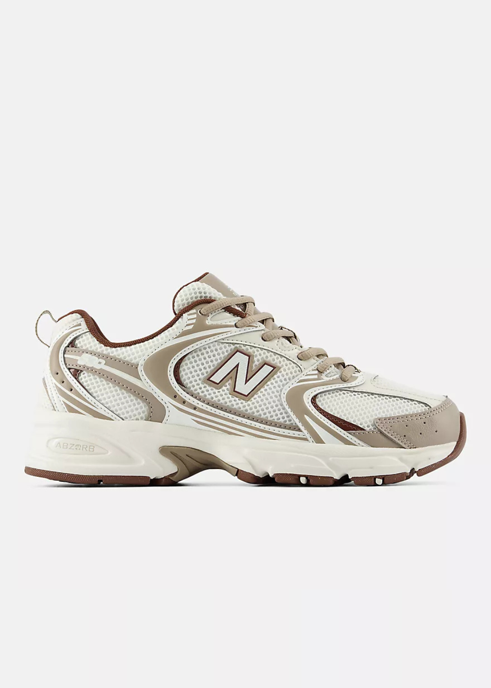 A New Balance sneaker in beige, cream, and brown, shown from a side profile view against a light gray background.