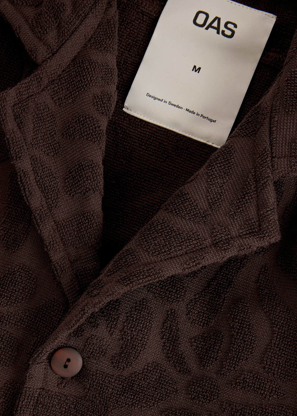 Close up view of the material and blossom design of the Blossom Cuba Terry Shirt by OAS Company