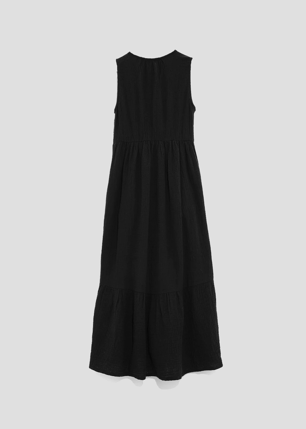 Back view of lightweight sleeveless black maxi length summer dress from Echo New York. Fit is a modern relaxed silhouette and super soft 100% cotton.