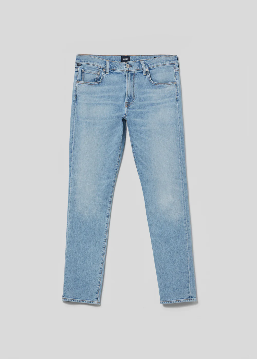 Front view of the London from Citizens of Humanity in bright light indigo. Slim fit jean that fits fuller in the thighs and tapers to the ankle.