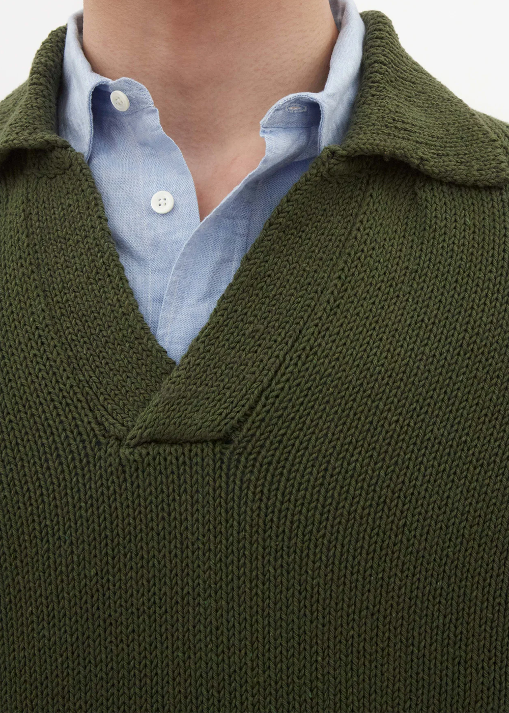 Close up shot of the polo collar, showcasing the texture and material of the Lasse Cotton Holiday Polo by Norse Projects.