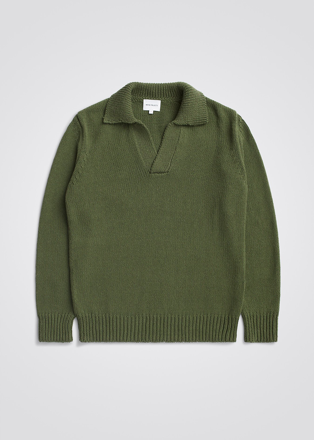 Zoomed out front view of the Lasse Cotton Holiday Polo in Ivy Green by Norse Projects.