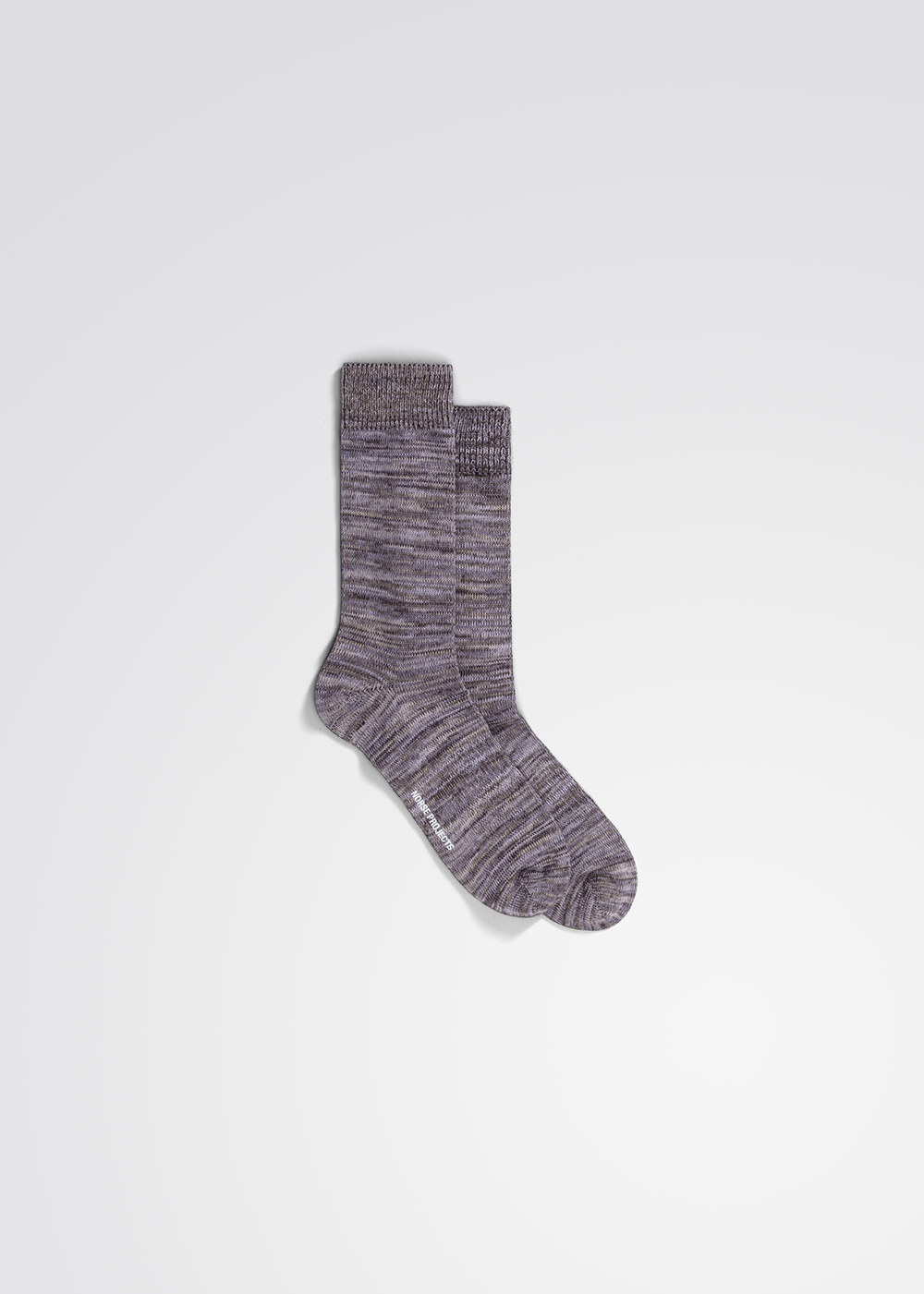Zoomed out view of the Bjarki Cotton Twist Sock by Norse Projects in Crocus Purple